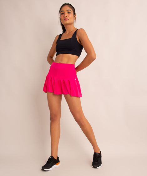 short saia com pregas esportivo rosa neon