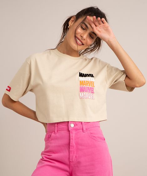 camiseta cropped oversized de algodão marvel manga curta decote redondo bege