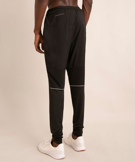 calça slim esportiva com recortes e refletivo preta