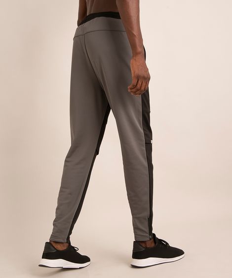 calça slim esportiva com abertura no joelho e refletivo preta