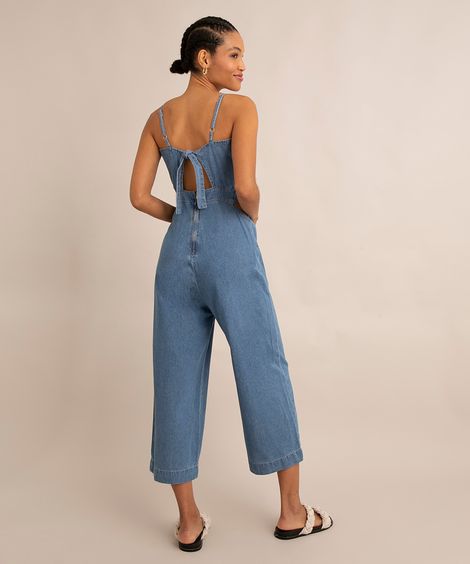 macacão jeans cut out com amarração alça fina azul médio
