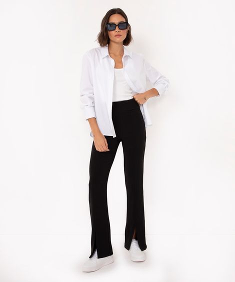 calça flare de malha cintura média com fenda preta