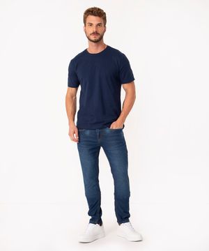 calça jeans skinny com bolsos azul escuro