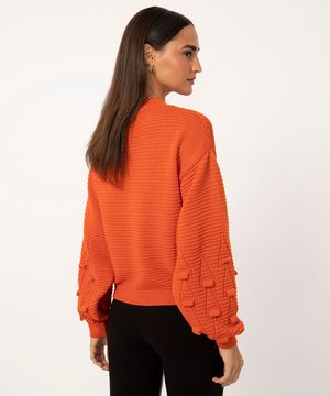 suéter de tricot manga bufante pom pom laranja