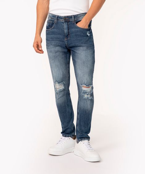 calça jeans carrot rasgada azul escuro