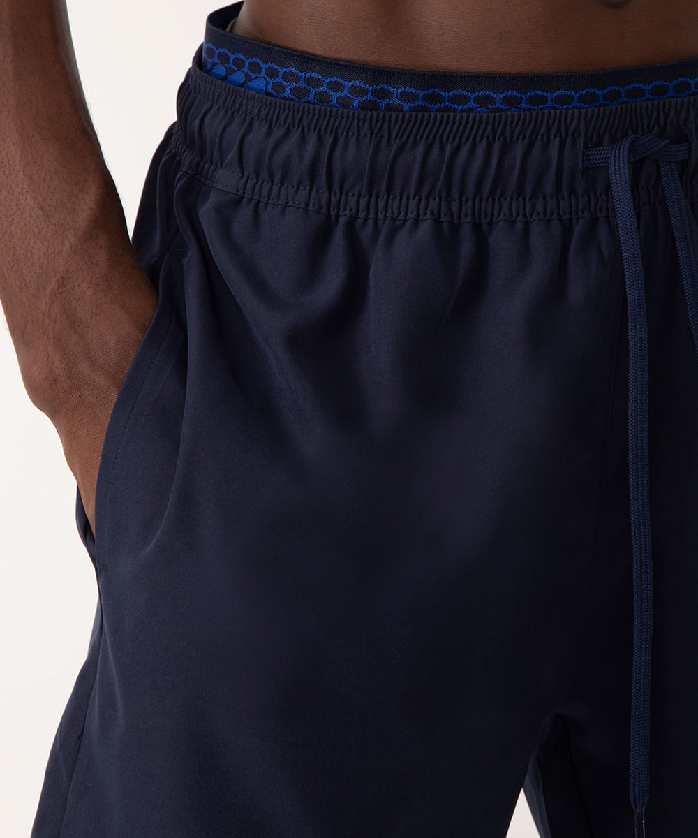 short com bolsos e elástico esportivo azul