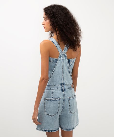 jardineira jeans com bolsos azul
