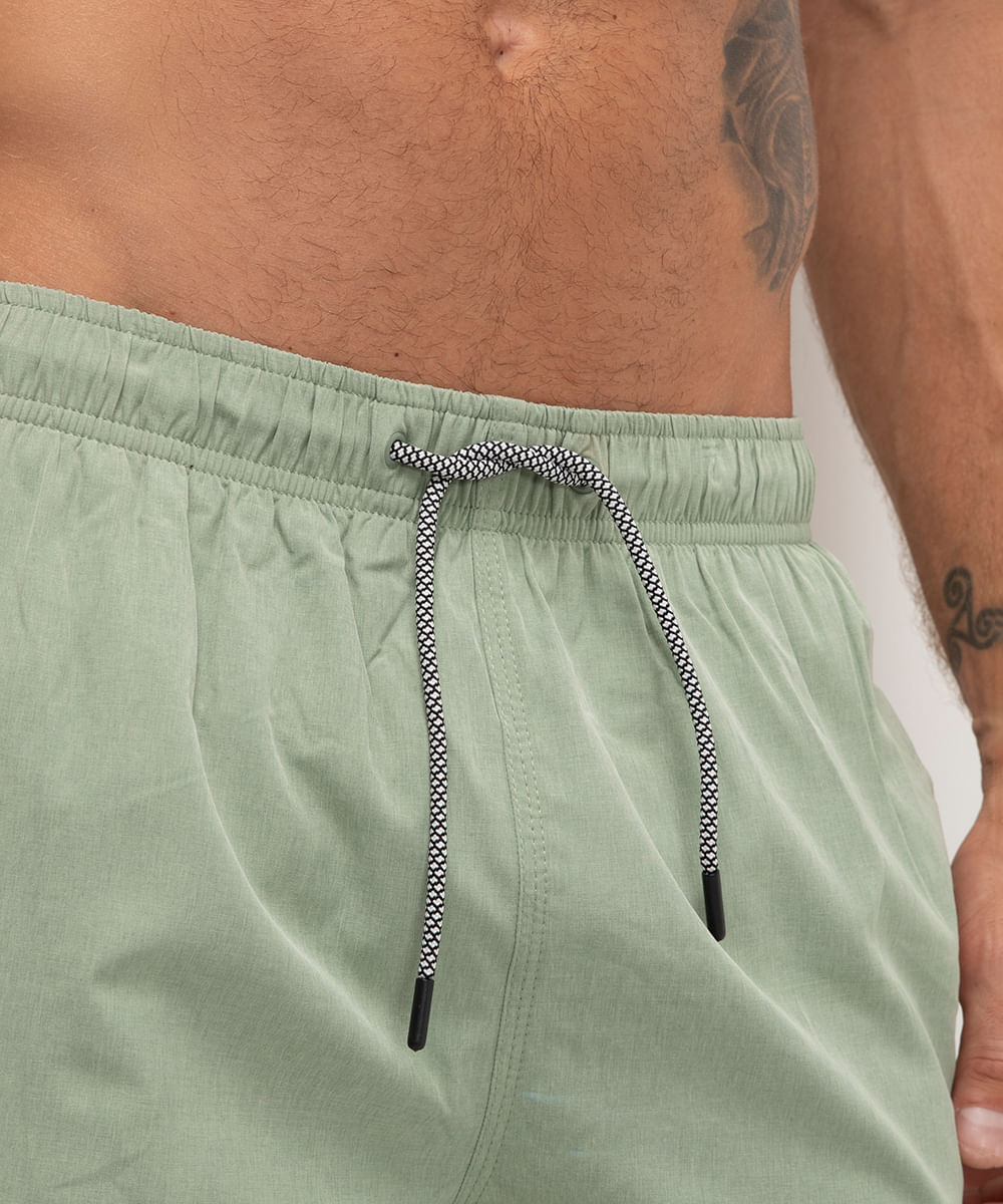 short praia com bolsos verde