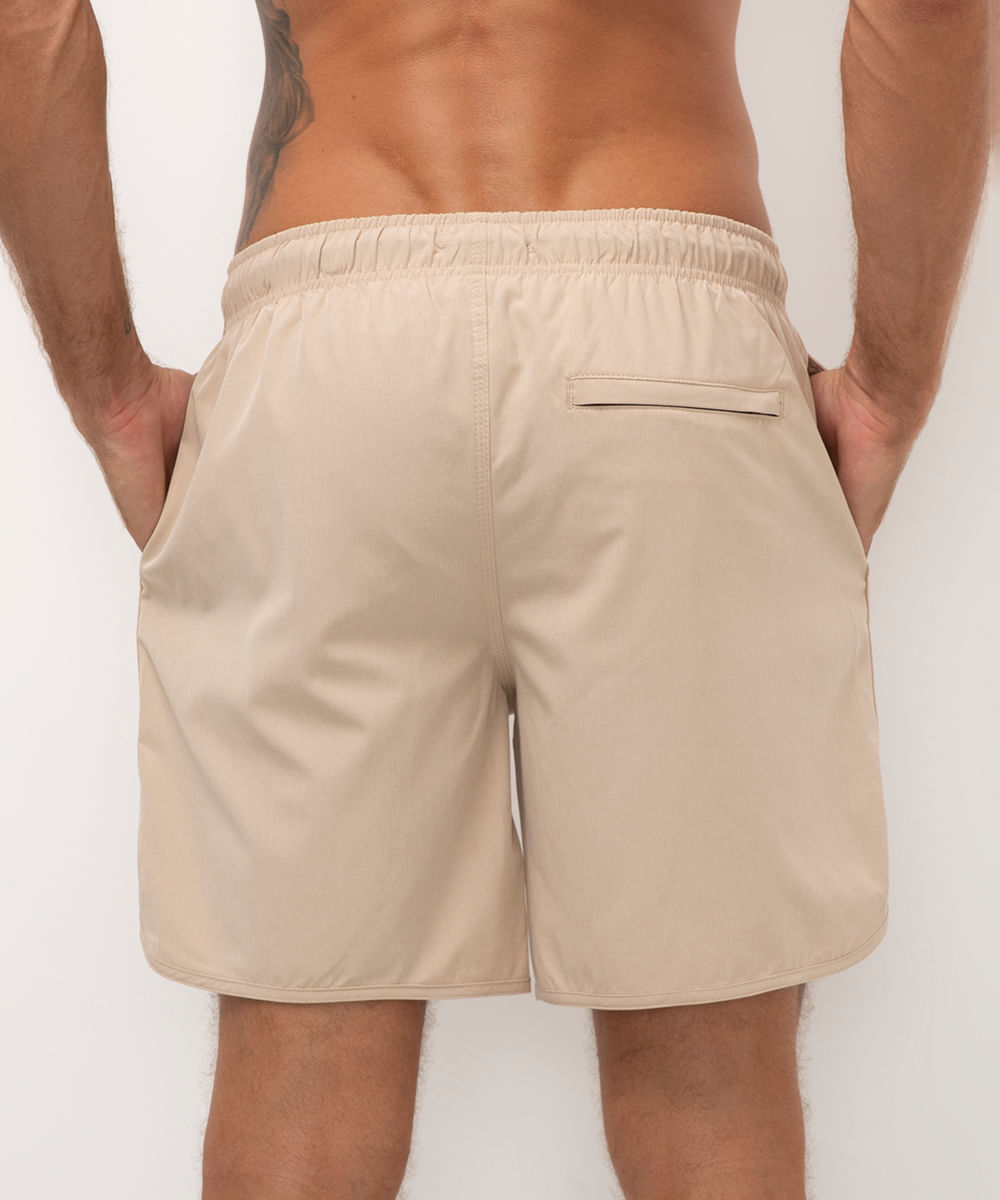 short praia com bolsos bege