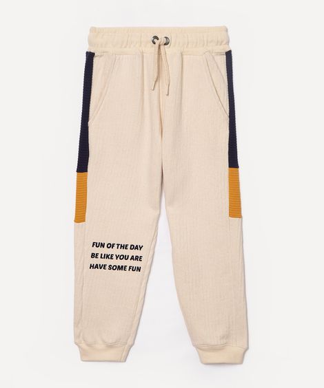 calça jogger de moletom infantil com recortes bege