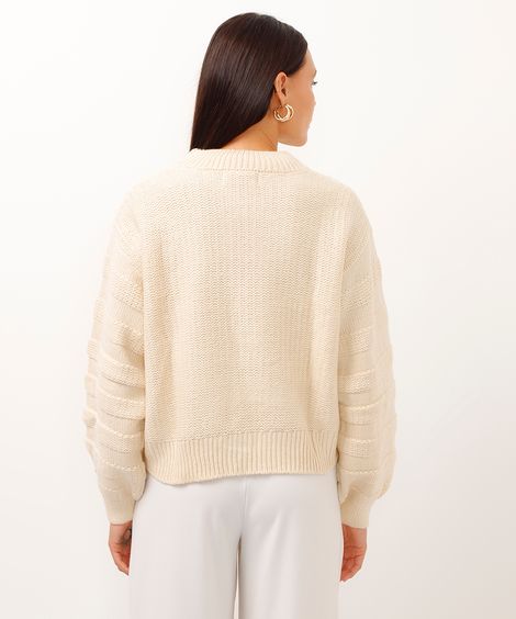 suéter de tricot manga bufante bege