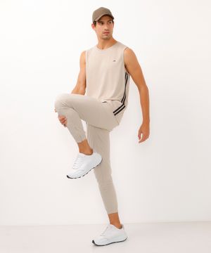 calça jogger slim com zíper na barra esportiva ace bege