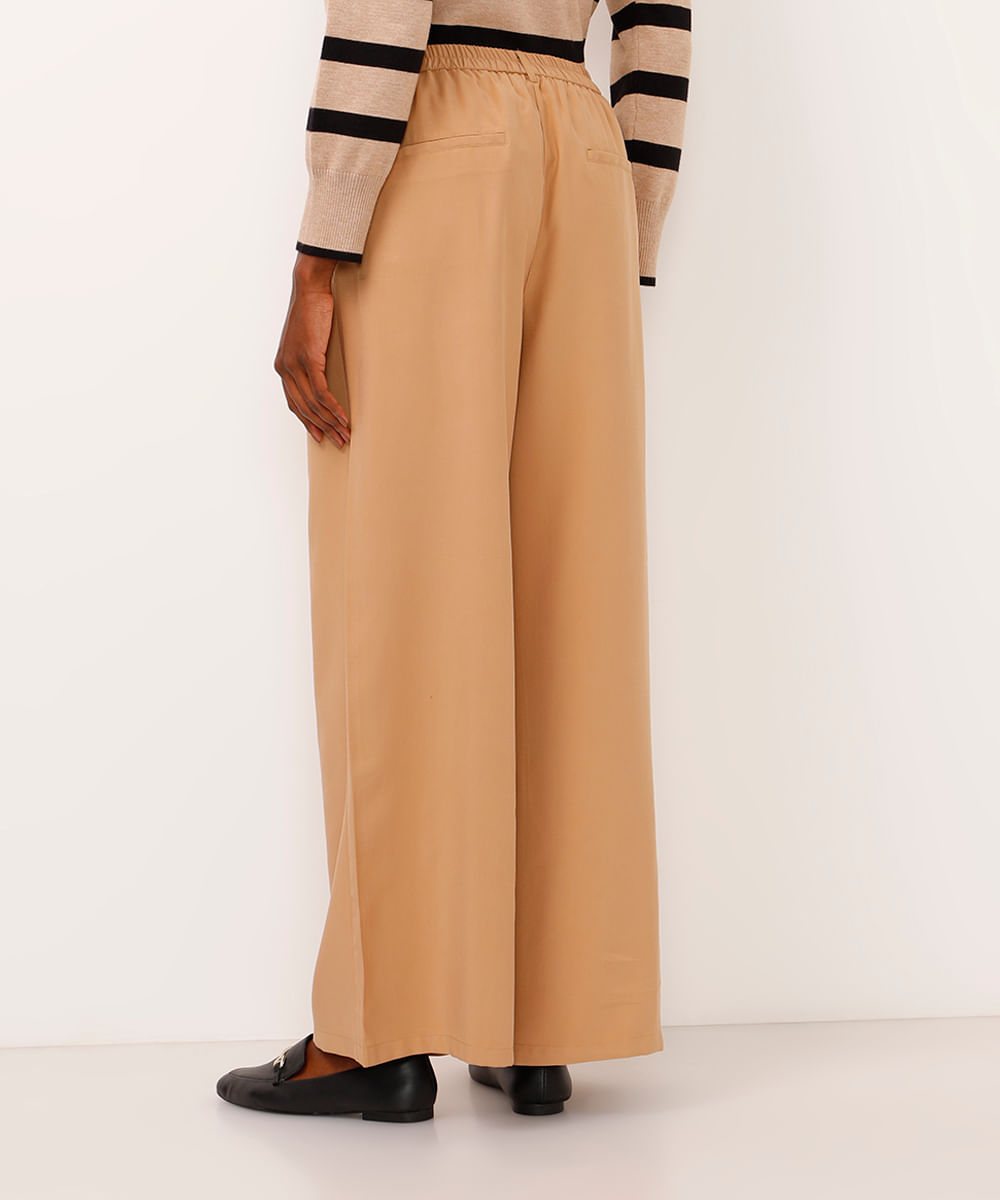 calça wide leg cintura alta com elástico e bolsos bege