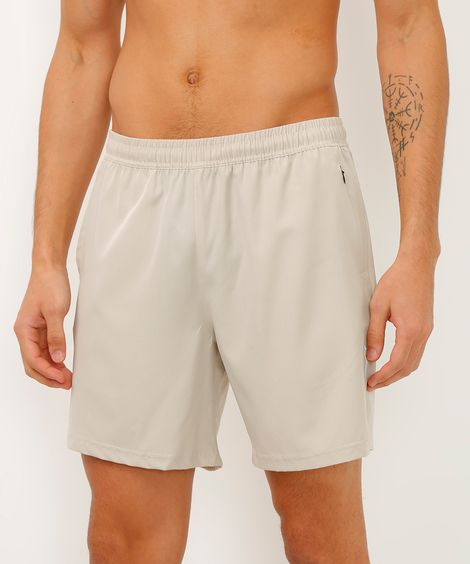 short reto com bolsos esportivo bege