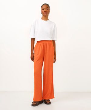calça wide leg com bolsos texturizada laranja