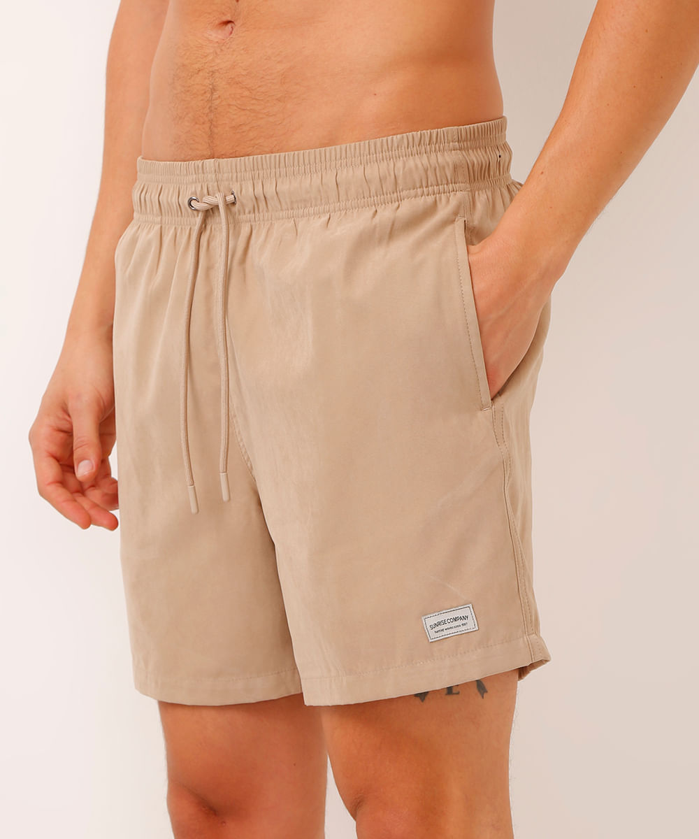 bermuda de suede com bolsos bege