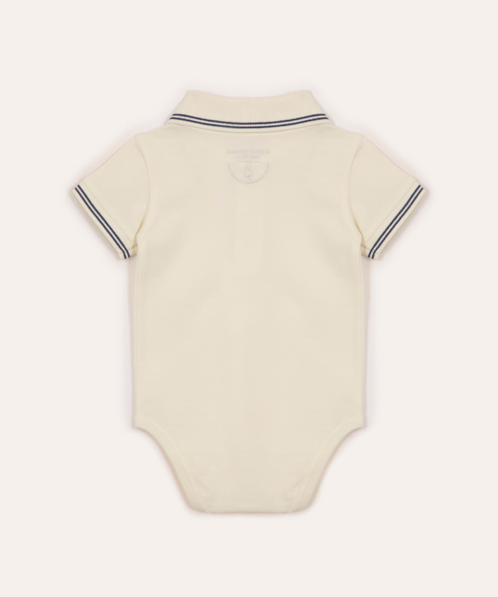 body polo de algodão peruano dinossauro off white
