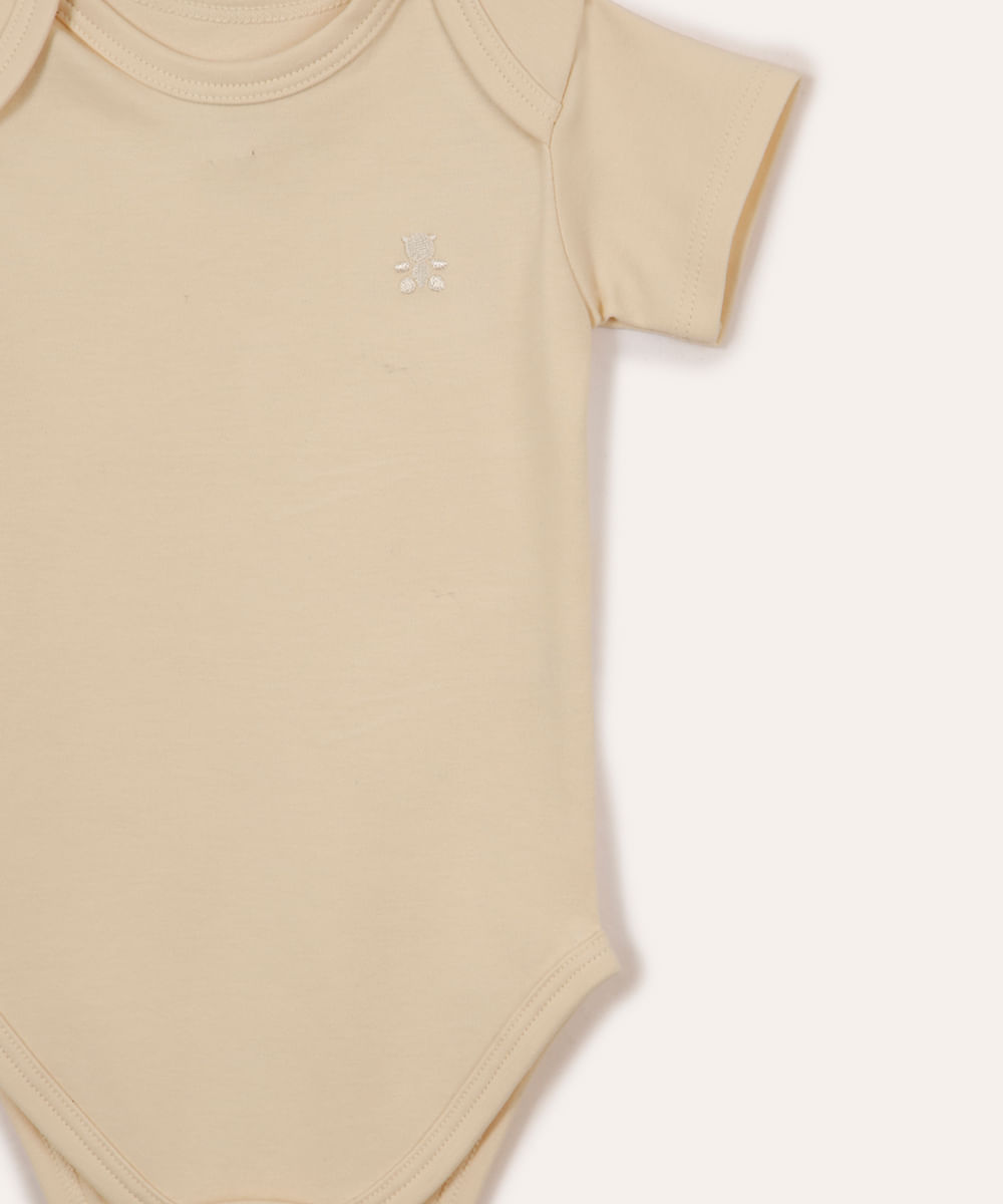 body de algodão peruano infantil manga curta bege