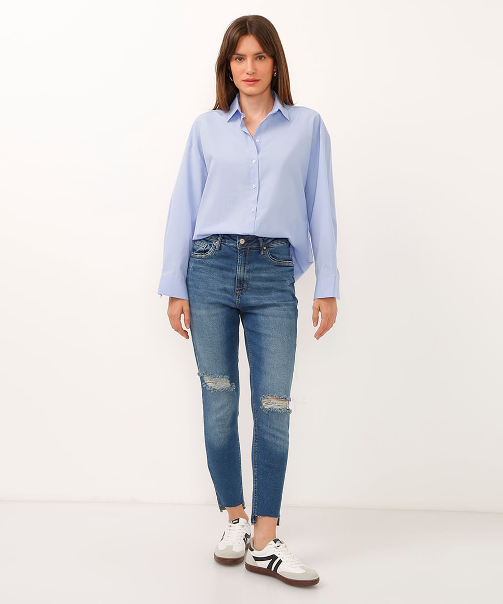 calça skinny jeans cintura alta destroyed barra assimétrica azul