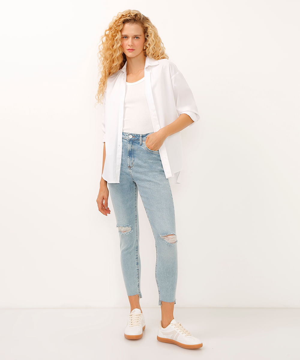 calça skinny jeans cintura alta barra assimétrica destroyed azul