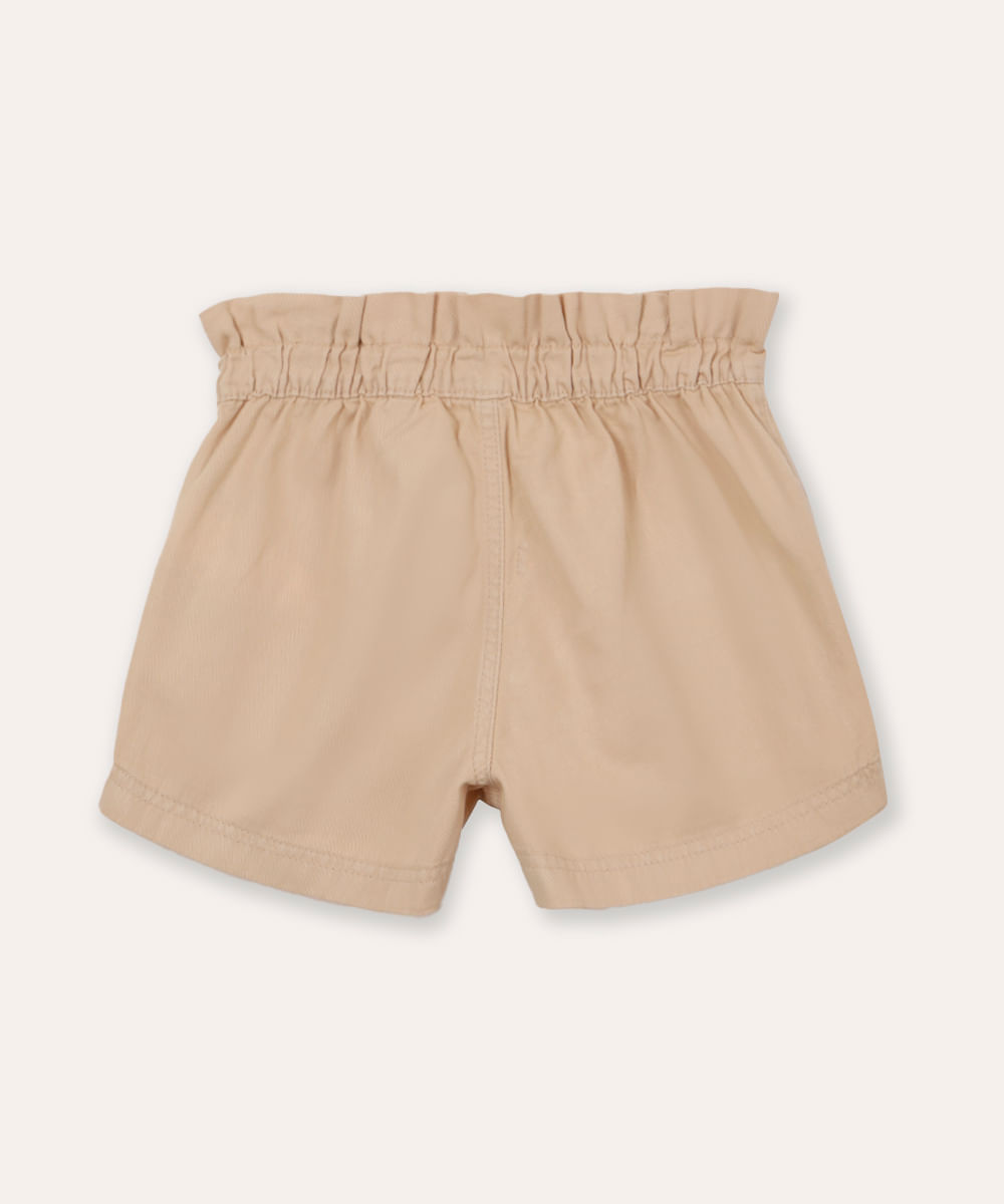 short chochard de sarja infantil com bolsos bege