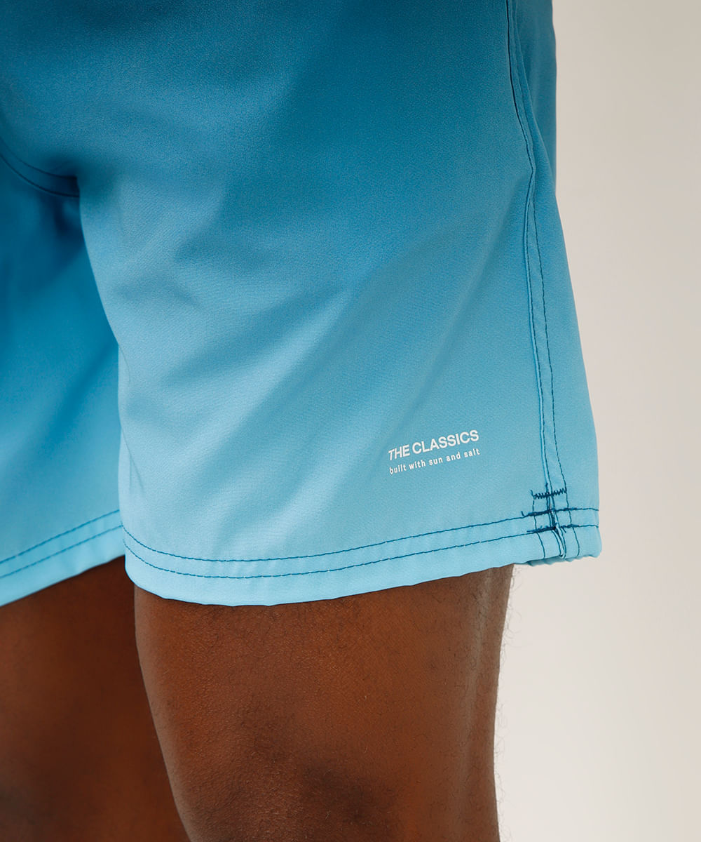 short cós com elástico e cordão degradê azul