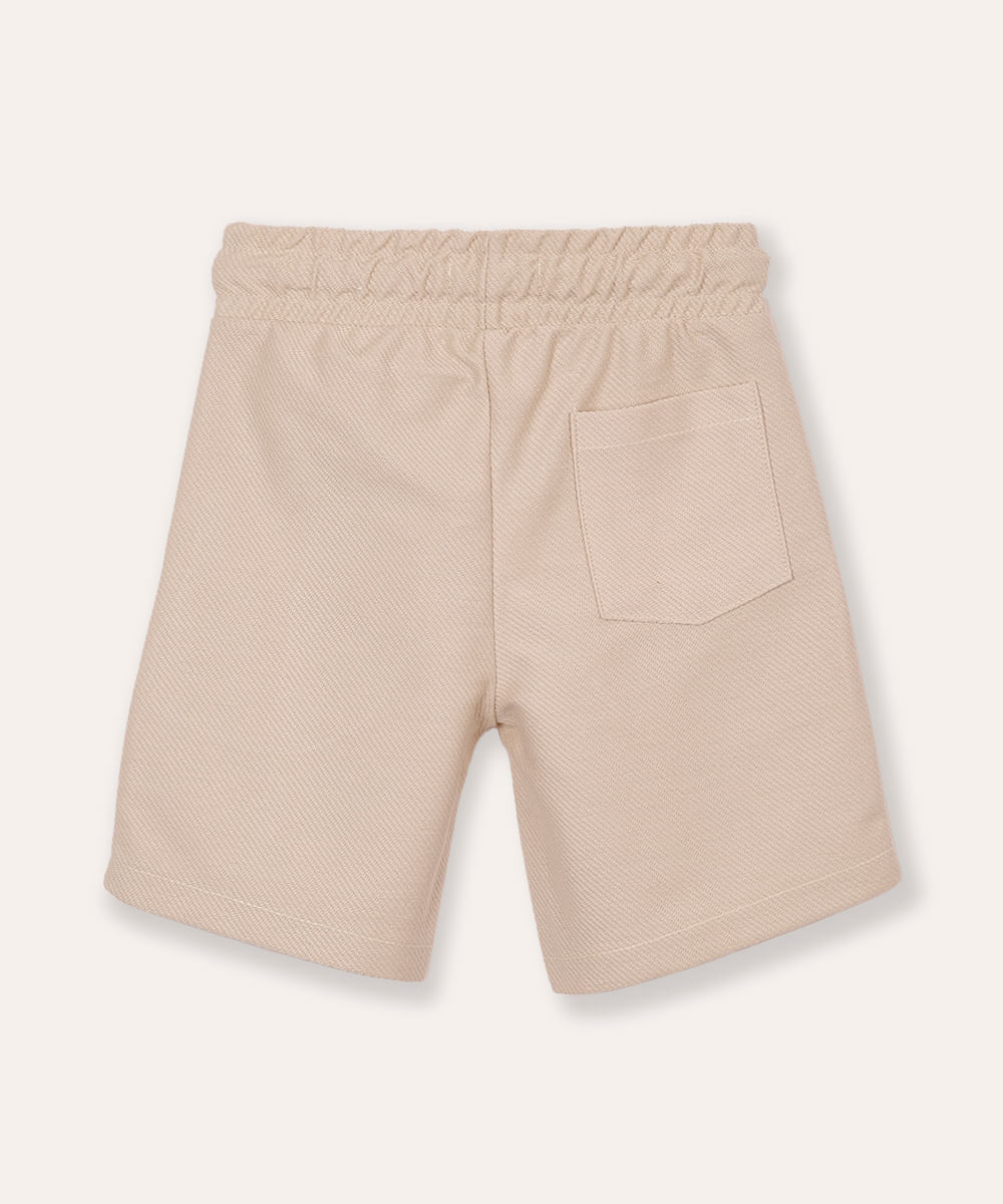 bermuda infantil texturizada com bolso bege
