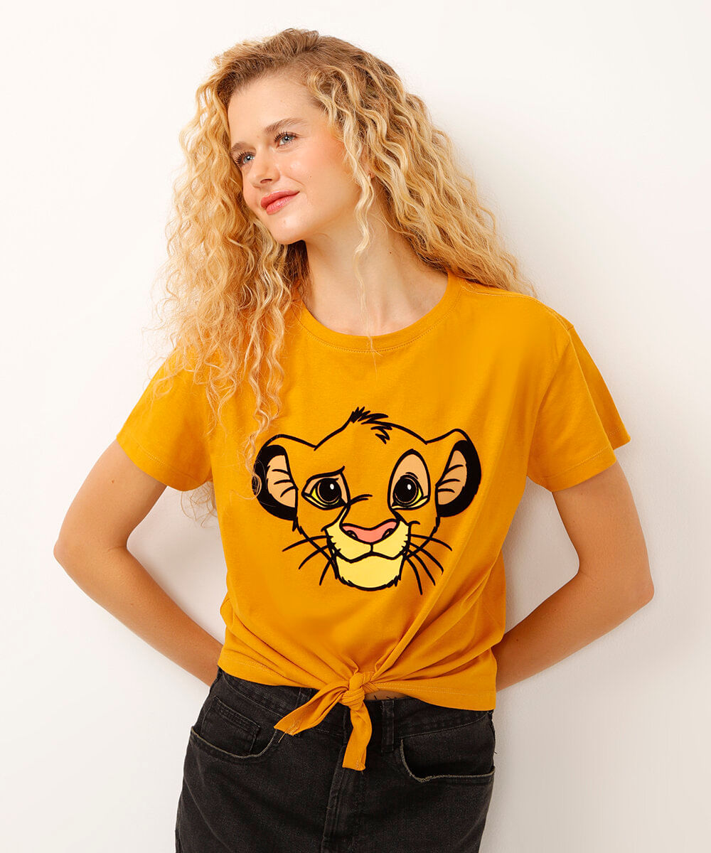 Camiseta Cropped de Algodão Simba O Rei Leão Flocada com Nó Manga Curta Decote Redondo Mostarda