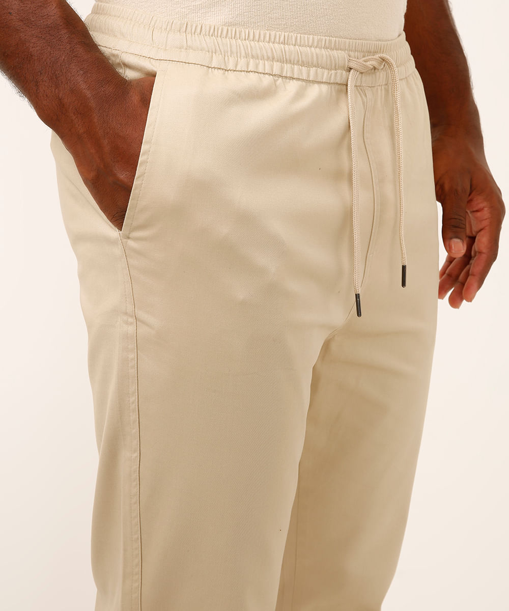 calça jogger de sarja cós com elástico e cordão bege