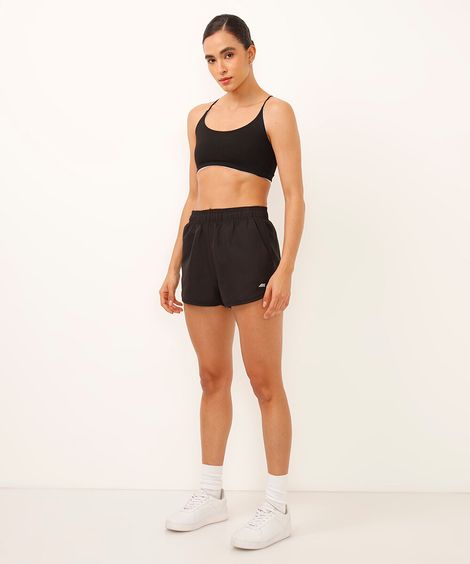 short running feminino com bolso esportivo preto