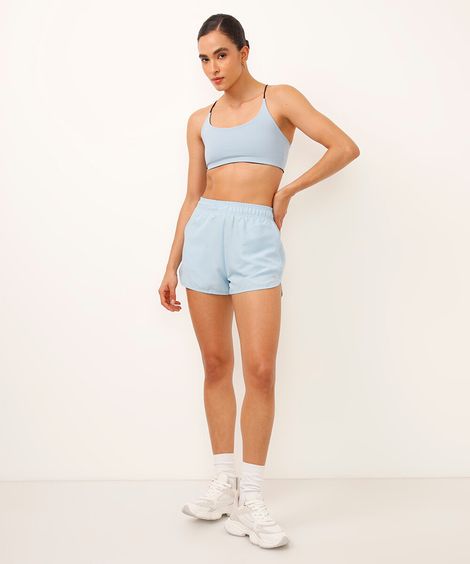 short running feminino com bolso esportivo azul