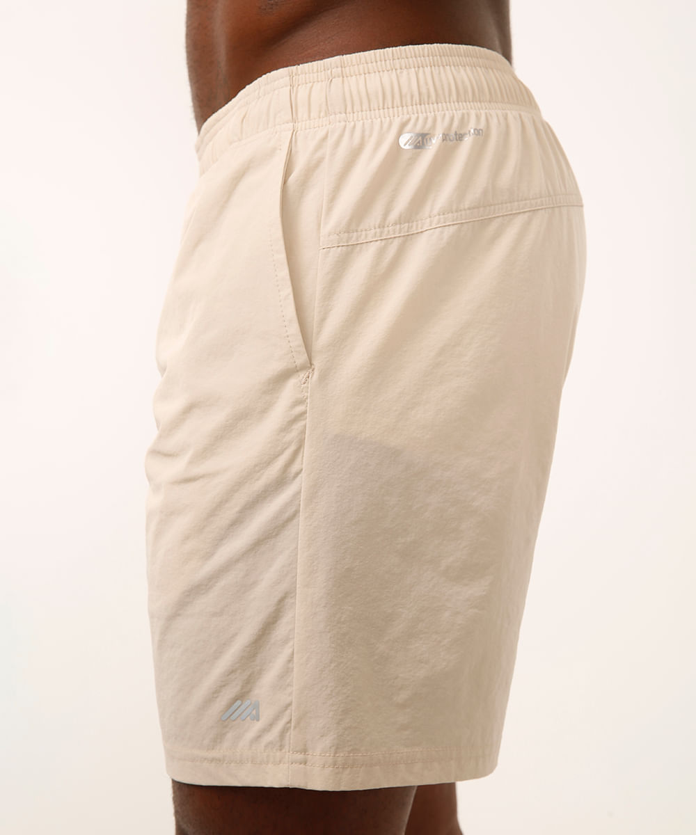 short com bolsos esportivo bege