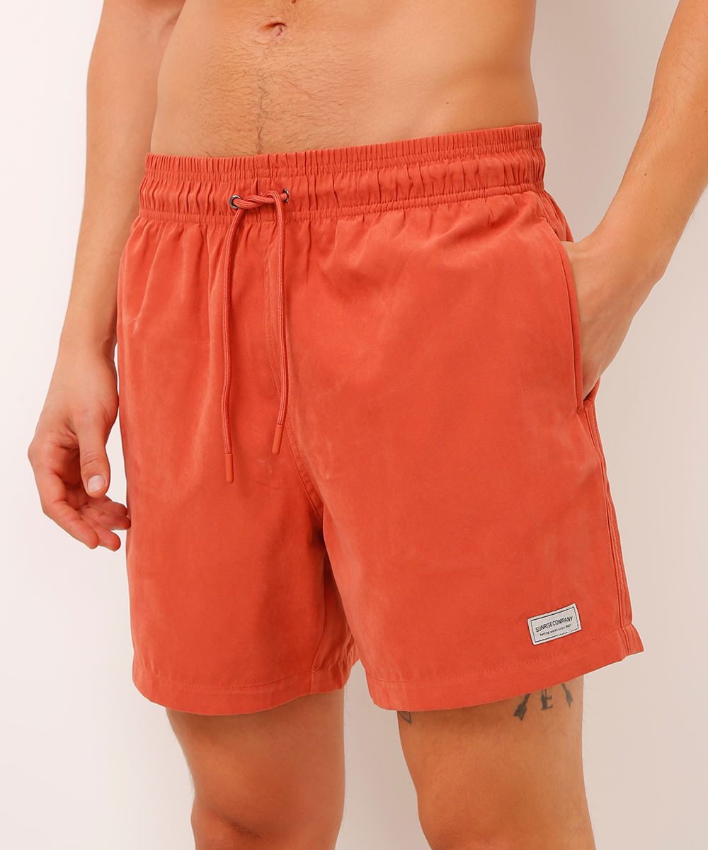 bermuda de suede com bolsos laranja