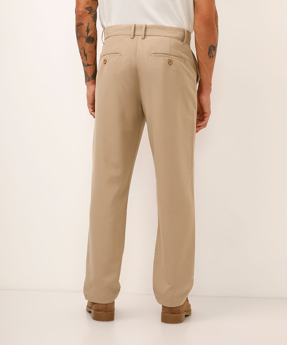 calça de alfaiataria com bolsos bege
