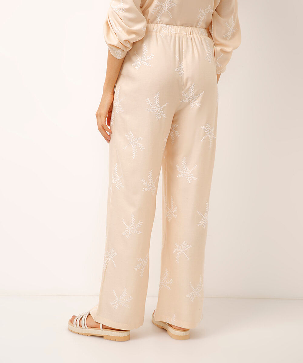 calça de viscose bordada folhagens bege