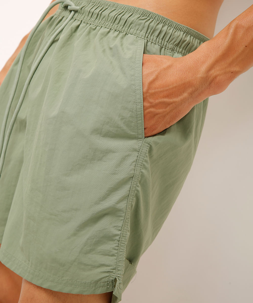short curto com cordão verde