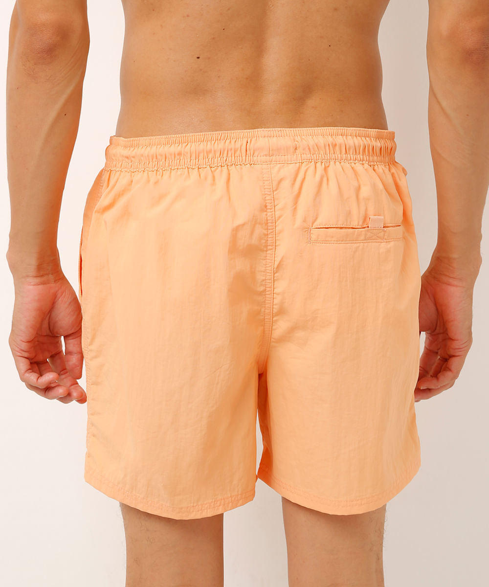 short curto com cordão laranja