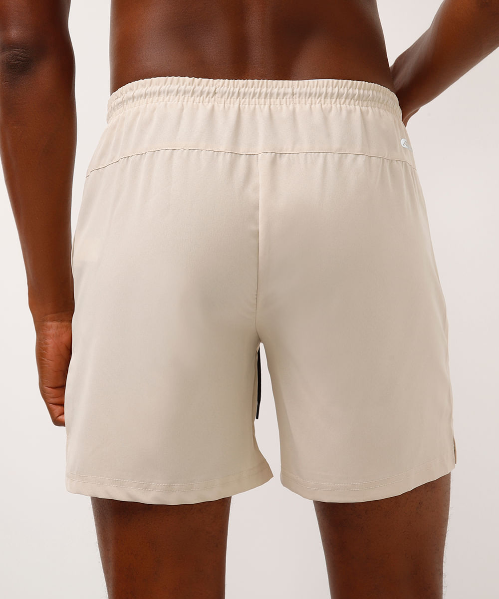 short running bolso com zíper esportivo - bege