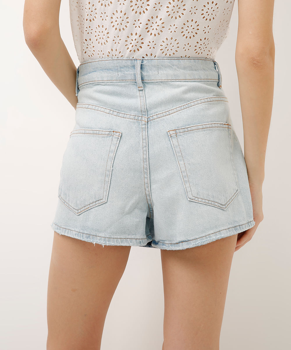 short saia jeans com barra arredondada azul