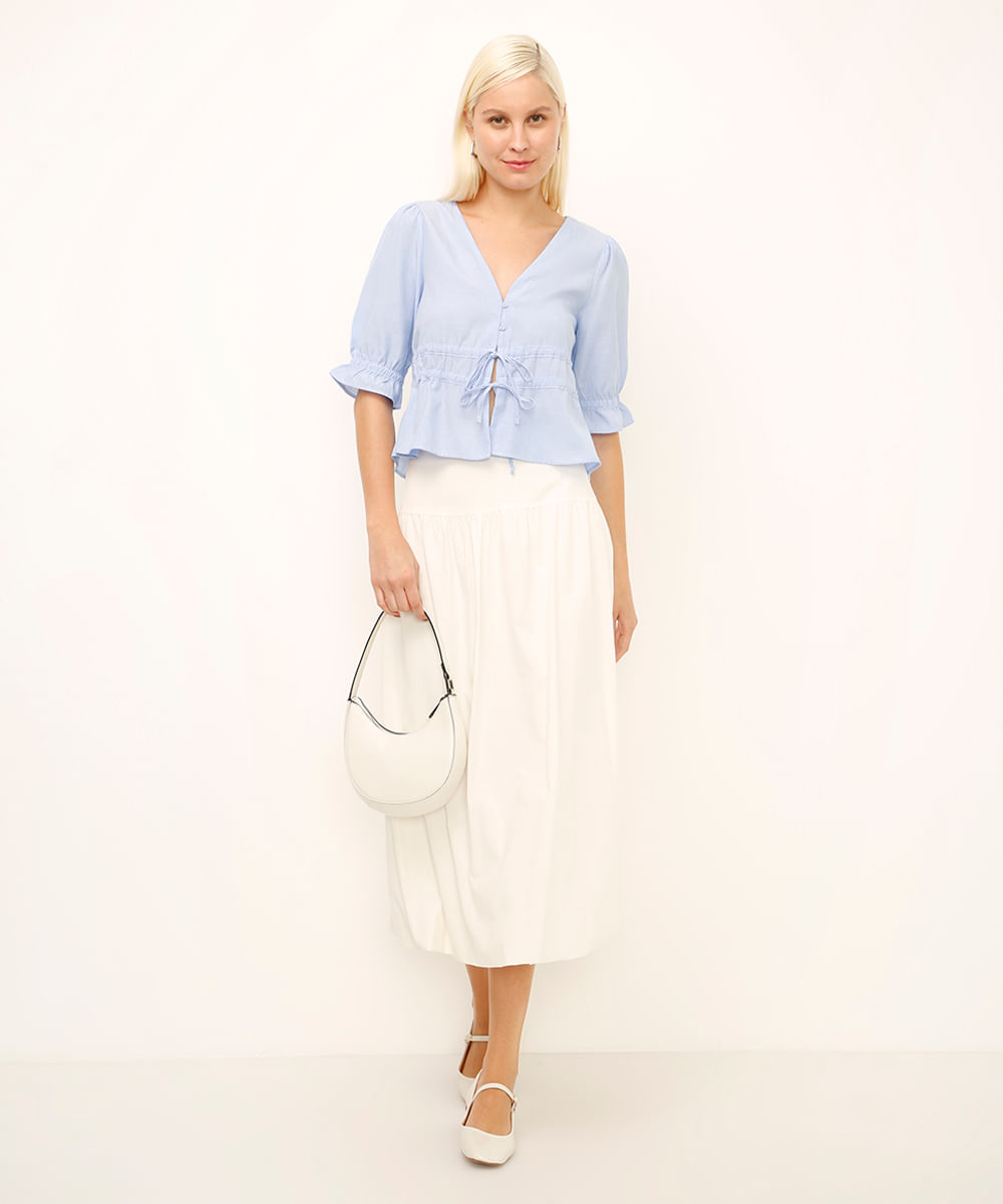 blusa manga bufante listrada com amarração azul