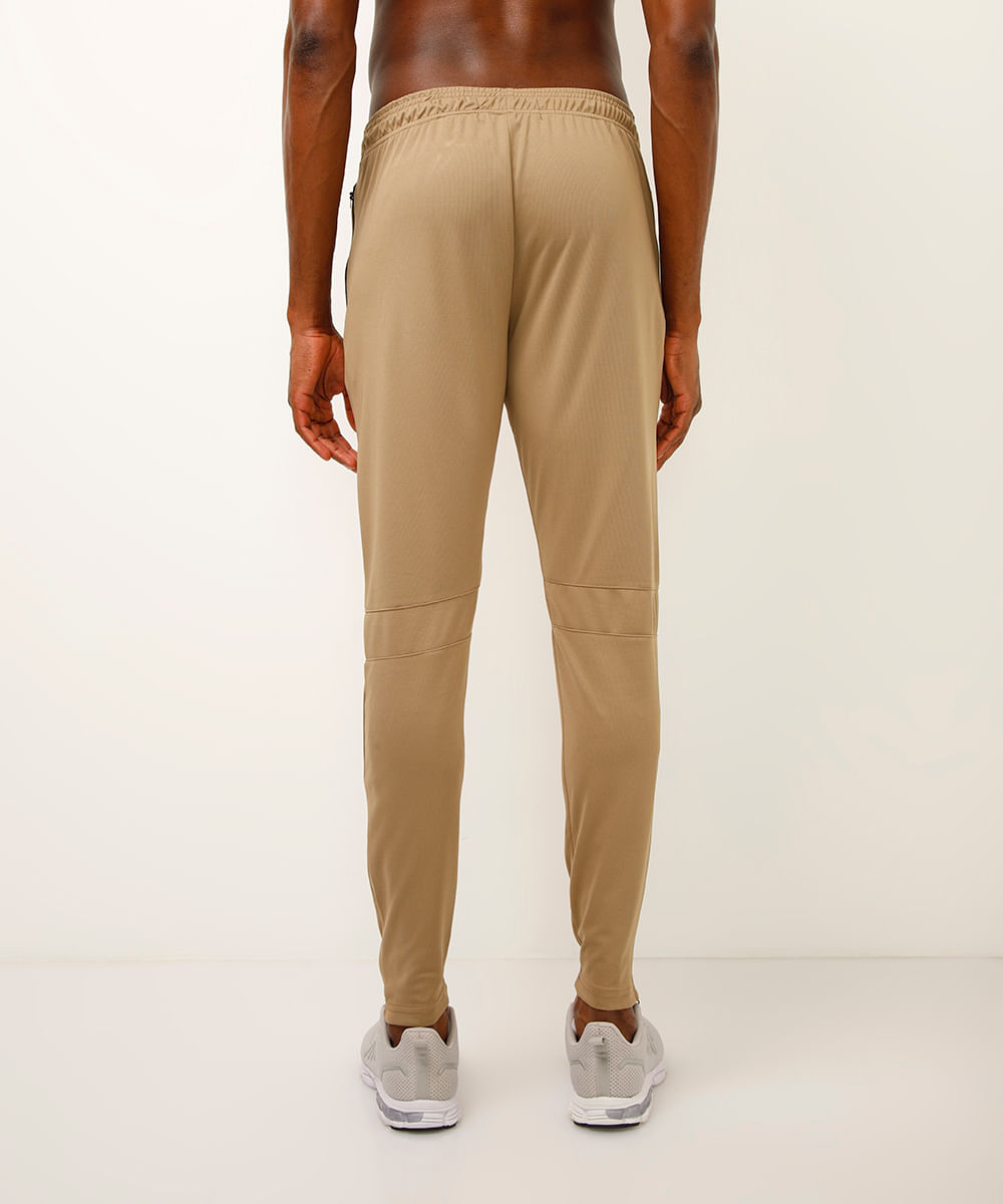 calça slim com recorte elástico e zíper esportiva marrom