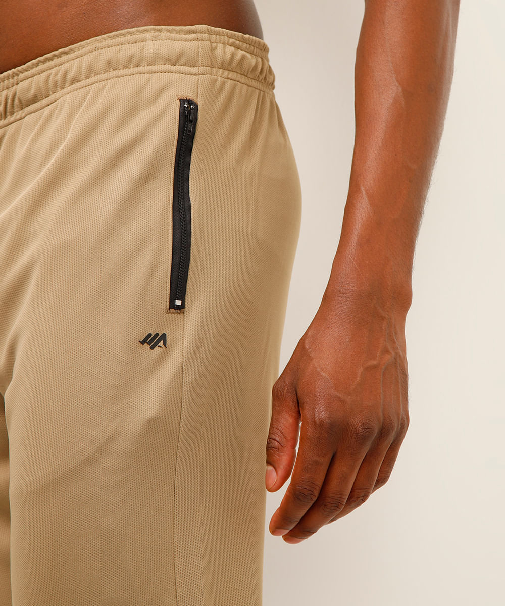 calça slim com recorte elástico e zíper esportiva marrom