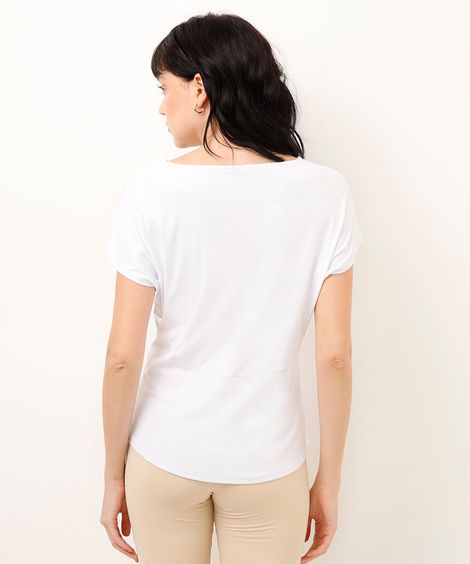 blusa esportiva com recortes e refletivo branca
