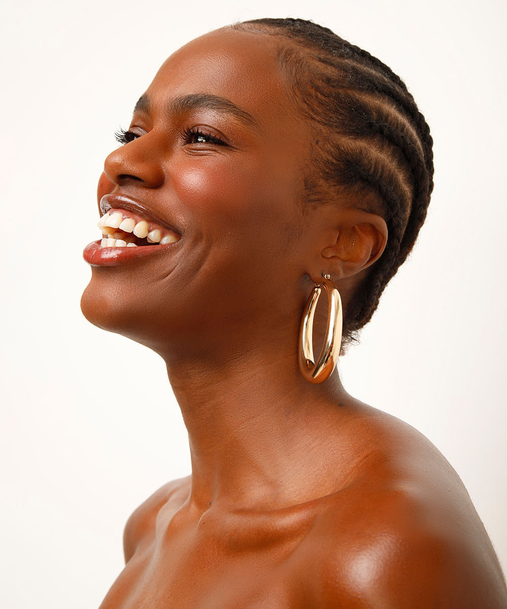 brinco argola alongada dourado