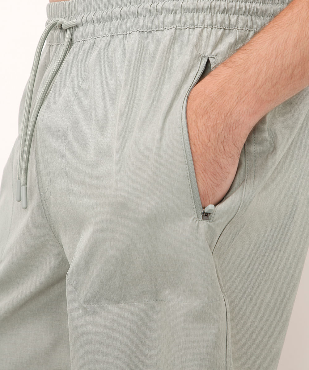 short cós elástico bolso com zíper verde