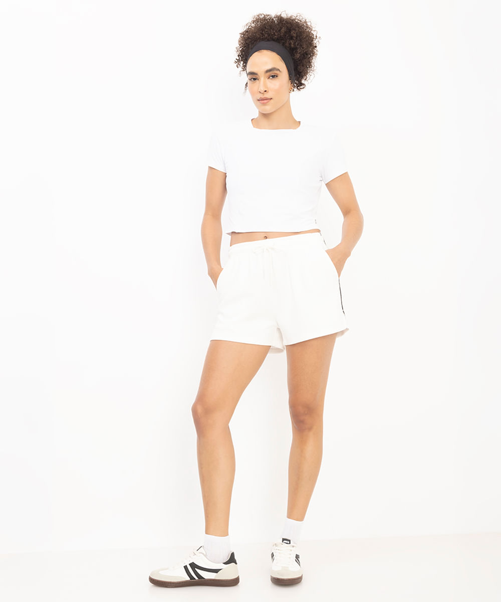 cropped feminino esportivo com recortes branco