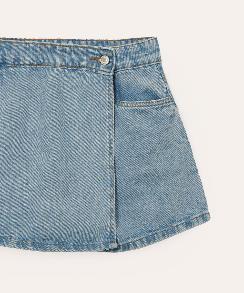 short saia jeans juvenil transpassado azul