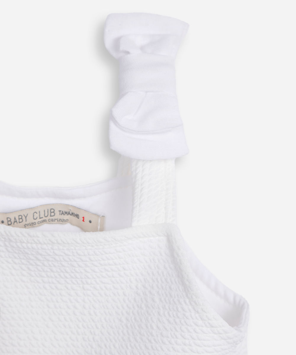 regata peplum infantil lacinho na alça texturizada off white