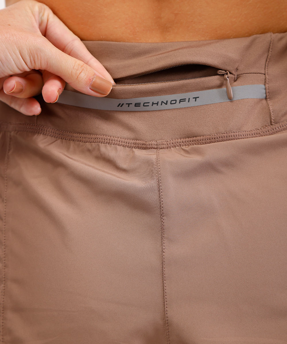 short running com forro e bolso esportivo marrom