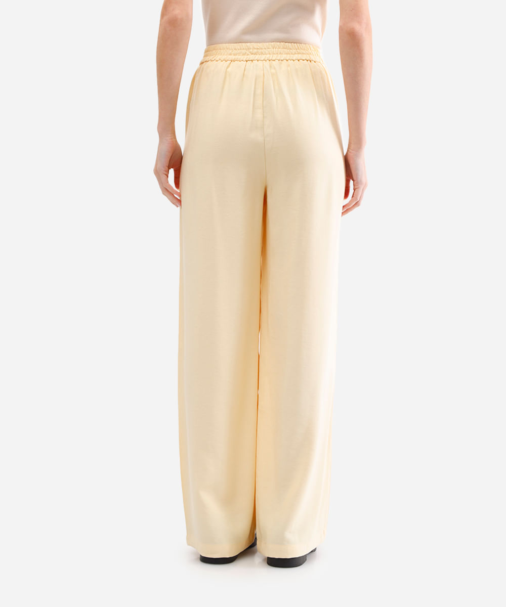 calça wide leg com pregas amarela